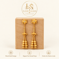 Floral earrings on wooden display with brand logo and three highlights