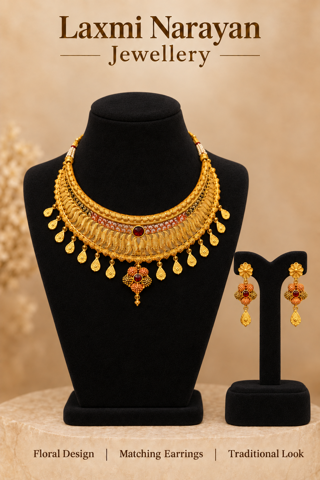Necklace and earrings set on black display