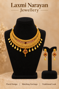 Necklace and earrings set on black display