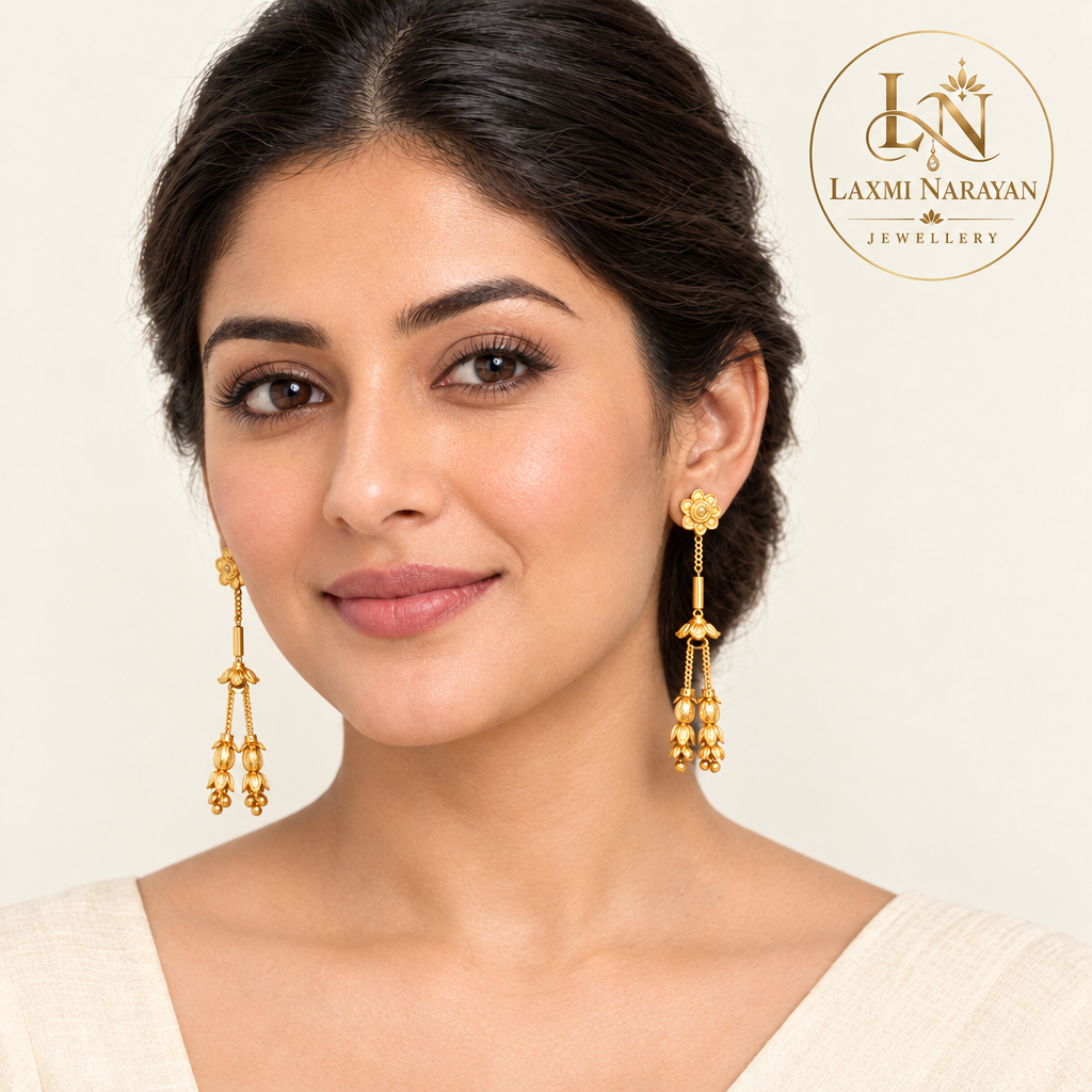 Model wearing floral earrings with two hanging strands