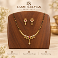 Petal design mangalsutra and earrings on wooden display